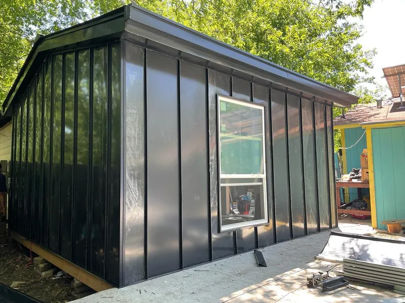 Black standing seam metal wall panels for Roof Inspection in Nuevo